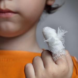 boy with a wound on his finger